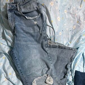 Blue Boot Cut Jeans with Distressed Details